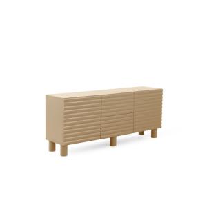 Buffet beige avec relief ondulé sur les portes et les tiroi…
