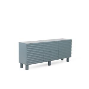 Buffet bleu avec relief ondulé sur les portes et les tiroir…