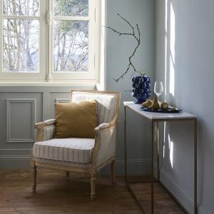 Console en marbre blanc et métal coloris laiton