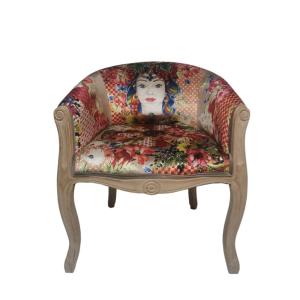 Fauteuil bergère en velours à motifs multicolores