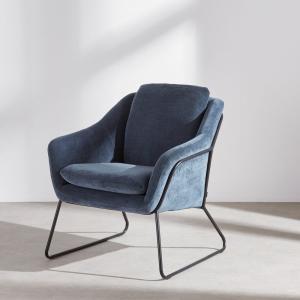 Fauteuil effet velours bleu de Prusse