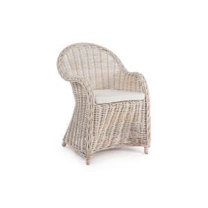 Fauteuil en rotin blanchi et coussin en coton