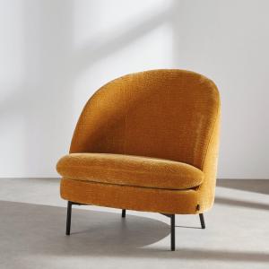 Fauteuil en tissu texturé ocre