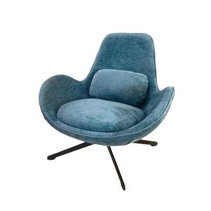 Fauteuil rotatif en velours turquoise