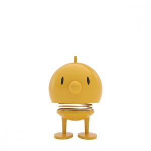 Figurine jaune H10,7cm