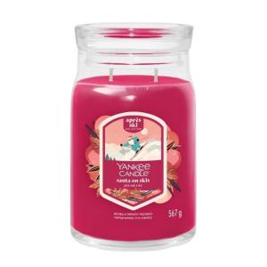 Grande bougie Père Noël à skis rose en verre