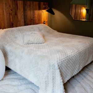 Jeté de lit imitation fourrure avec relief géométrique poly…