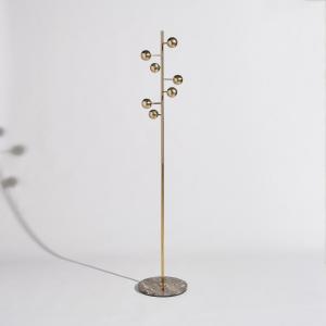 Portant en acier et fer forgé doré et marbre marron