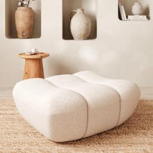 Pouf repose-pieds en tissu bouclé blanc