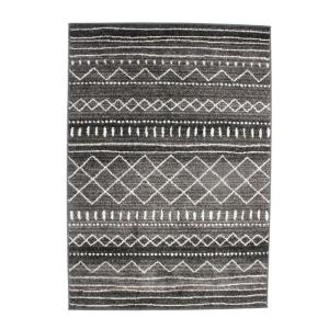 Tapis toucher laineux imprimé motifs hniques noir 133x190